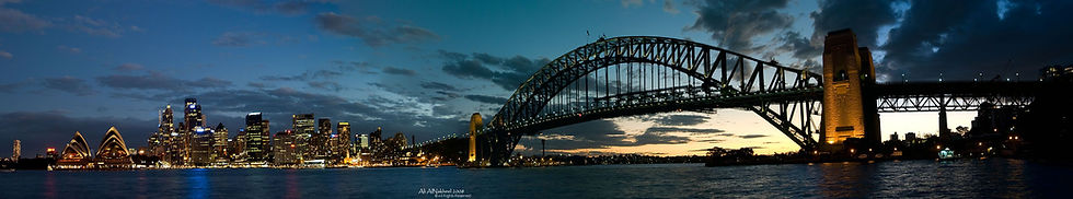 sydney harbour bridge and city skyline at night with Logisticaltrader
