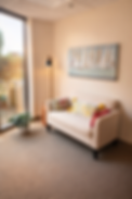 therapy-room-swampscott-ma-tili-cozy-couch-natural-light-sailboat-art.jpg