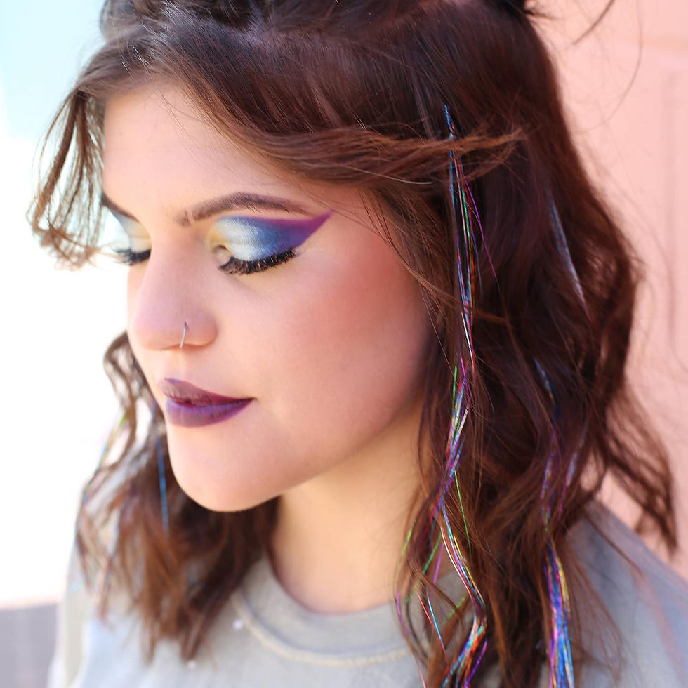Festival hairstyle with colorful hair tinsel accents