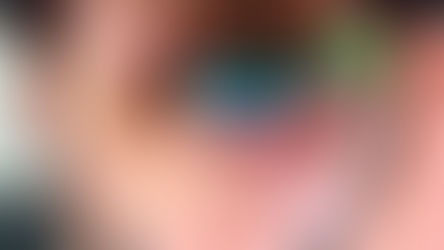 Man with computer screen reflecting off his glasses