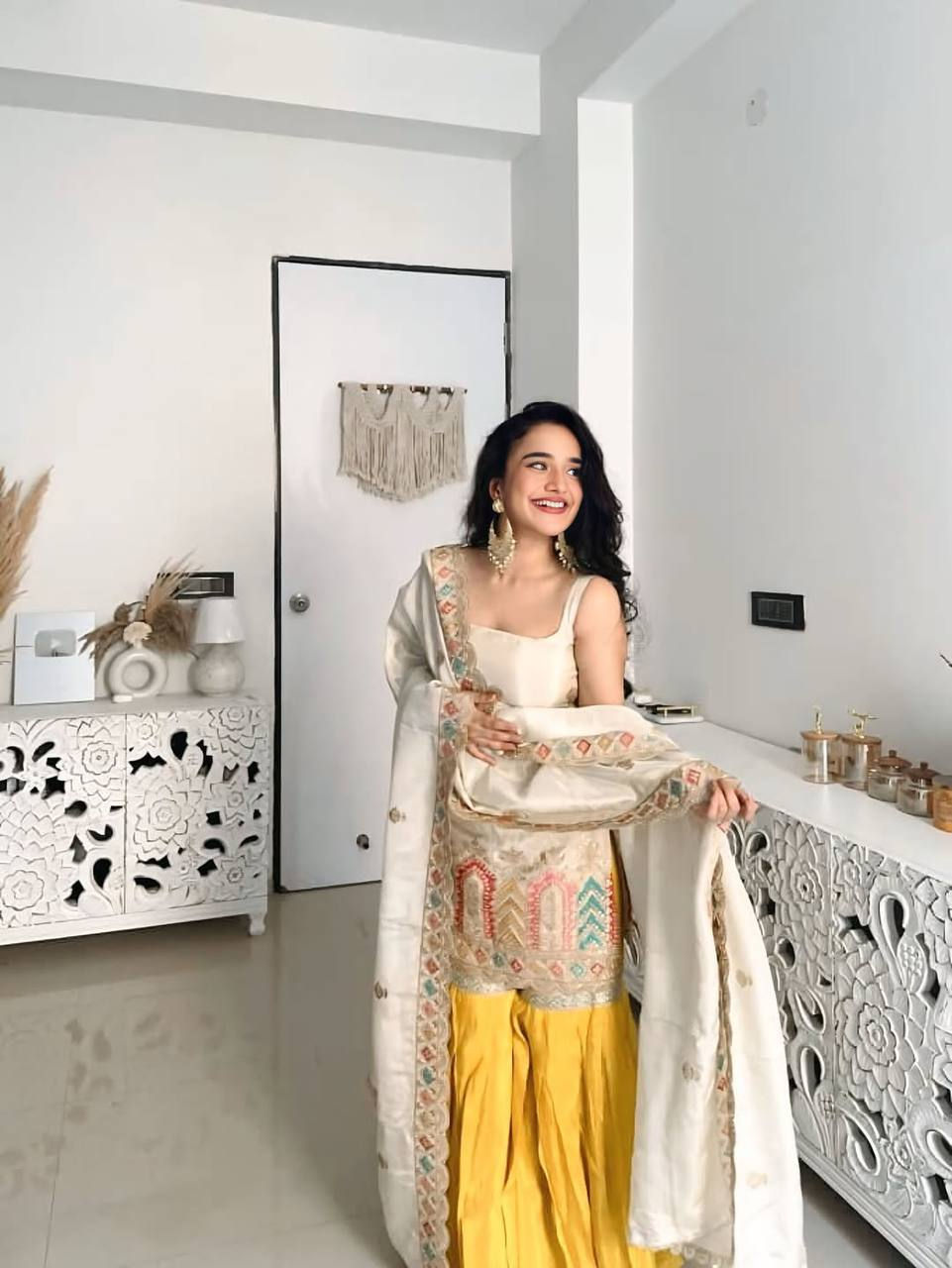 Thumbnail: Haldi Function Wear White Top With Yellow Sharara And Dupatta