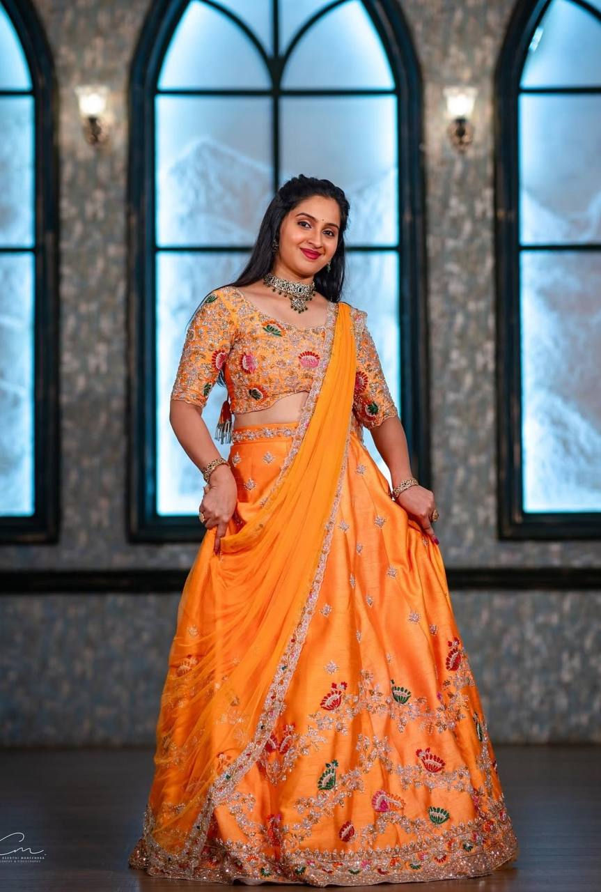 Amazing Orange Colour Georgette Sequence With Embroidery Work Lehenga Choli