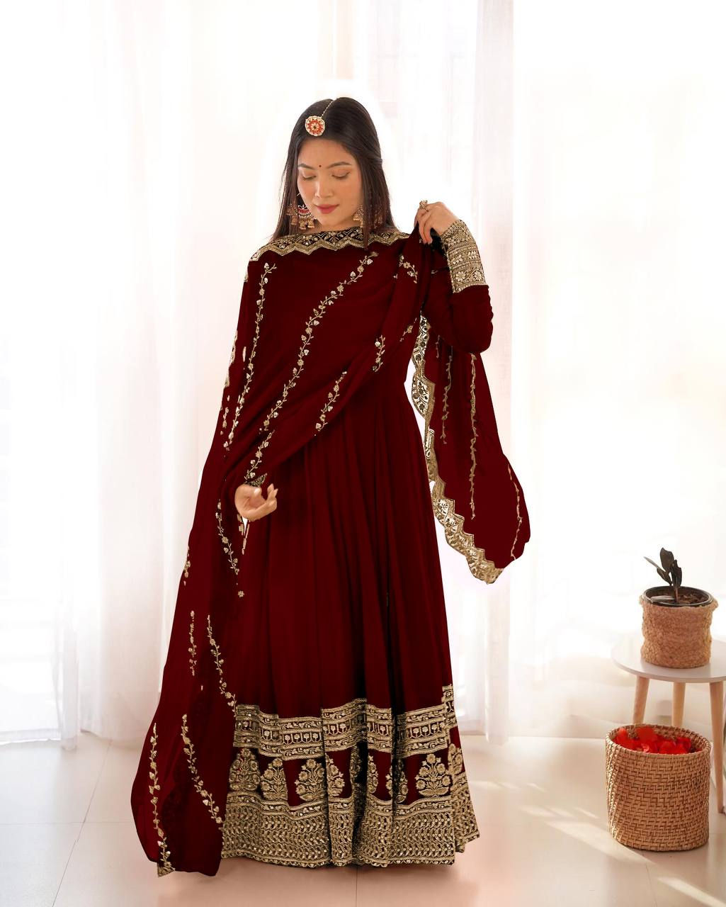 Maroon Colour Wedding Wear Long Gown With Heavy Work Border