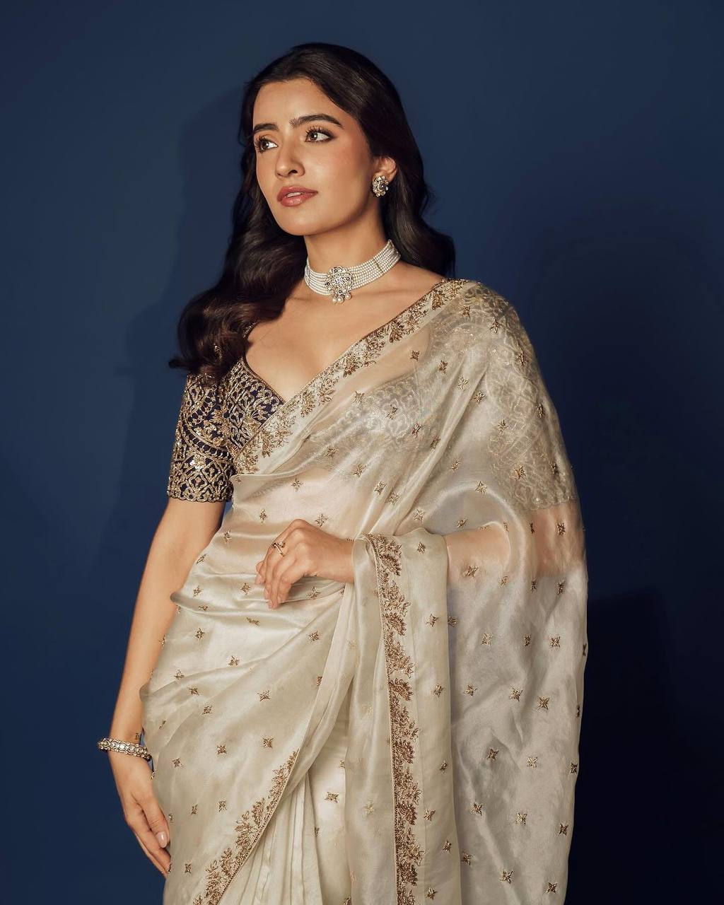 Desirable Cream Colour Thread With Sequince Work Party Wear Saree