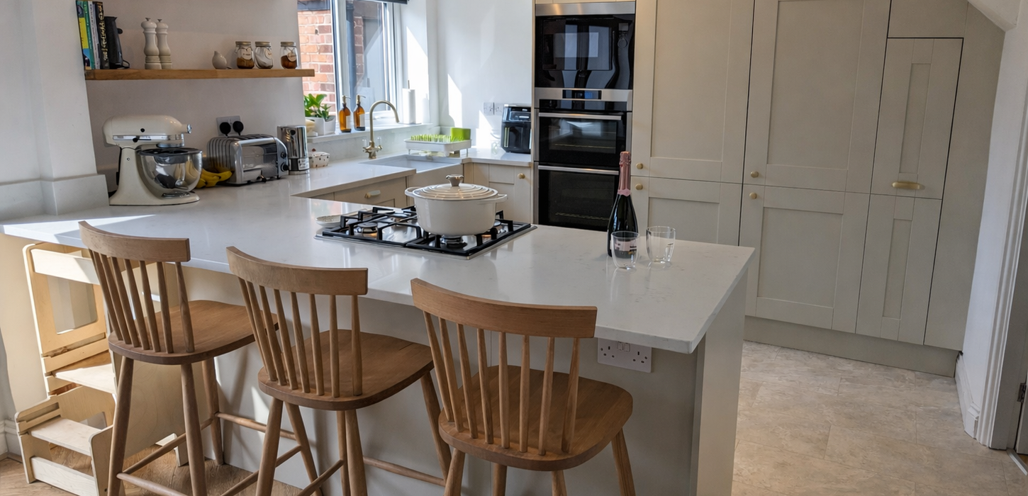 Symphony Cranbrook kitchen in stone matt with Massa quartz worktops in Wirral
