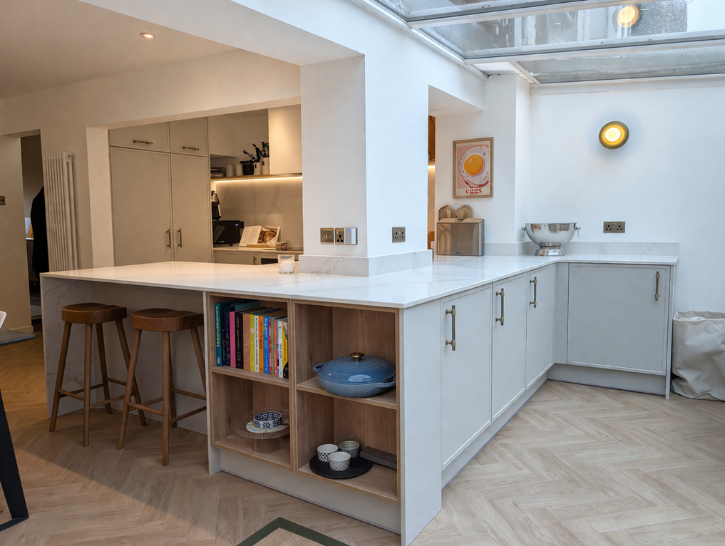 Bright bespoke kitchen in West Kirby Wirral with smart storage, open shelving, integrated appliances and bar area