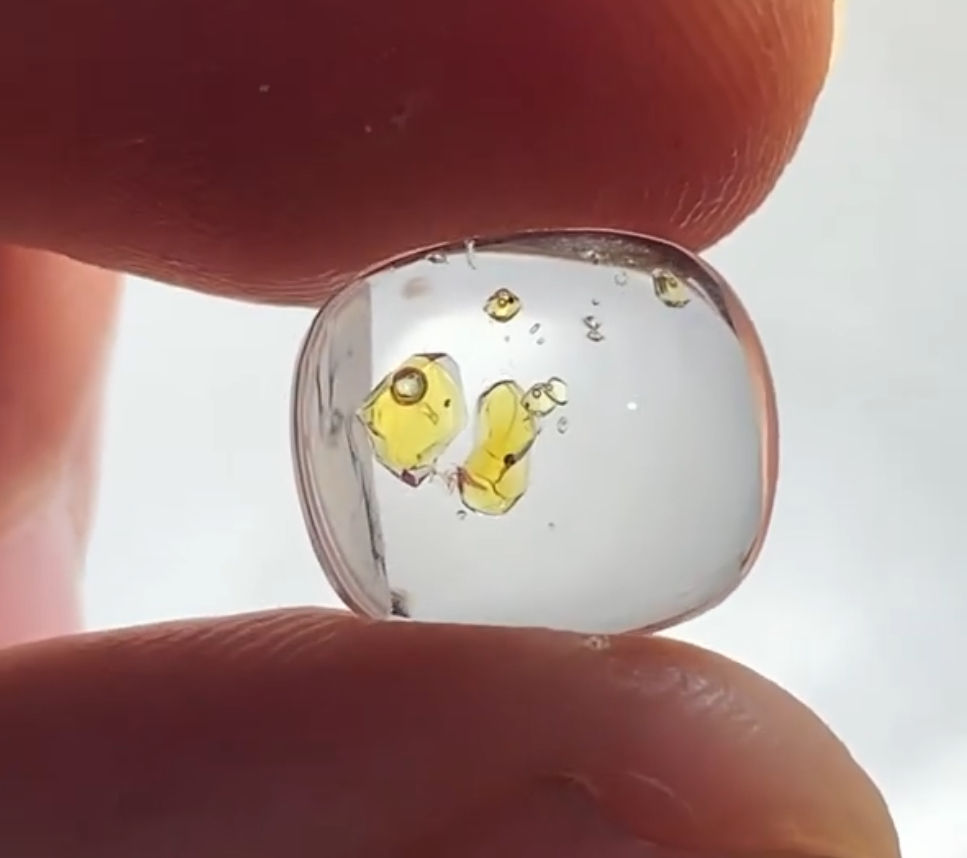 This Quartz crystal features a single air bubble inclusion, a subtle yet telling sign of its natural growth environment.