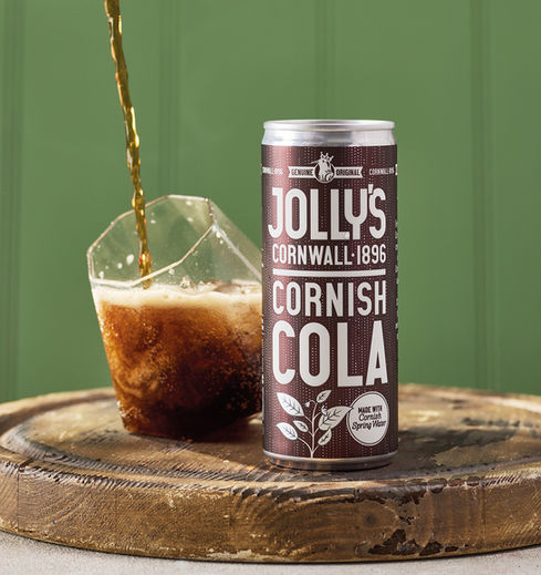 Jolly’s Drinks Cornish soft drinks, authentic Cornish soft drinks brand, Jolly’s Drinks since 1896, heritage soft drinks company Cornwall, family recipe soft drinks Cornwall, crafted soft drinks Carharrack origins, Jolly’s Drinks Saltash spring water, Cornish spring water soft drinks, premium soft drinks made in Cornwall, traditional recipes modern soft drinks, quality ingredients bold flavours, small batch soft drinks UK, Cornish ginger beer with chilli, Jolly’s Ginger Beer Cornish chilli, fiery Cornish ginger beer mixer, Cornish cola premium mixer, sparkling apple soft drink, sparkling orange soft drink, pink lemonade soft drink, Cornish soft drinks range UK wide, independent soft drinks producer, craft soda brand Cornwall, local ingredients soft drinks, sustainably minded drinks brand, eco-conscious soft drinks packaging, recyclable drinks cans Cornwall, authentic Cornish brand storytelling, proudly Cornish drinks company, soft drinks for discerning customers, premium soft drinks for cocktails, mixers for Cornish rum and spirits, ginger beer dark rum and lime serve, soft drinks for mocktails and long drinks, Jolly’s Drinks UK stockists, traditional flavour with modern twist, reduced sugar balanced recipes, soft drinks with bold natural flavours, heritage inspired drinks branding, Cornish culture in a can, taste of Cornwall soft drinks, local favourite drinks now nationwide, small passionate drinks team, flavour-obsessed drinks makers, sustainability champions in drinks industry, community-focused Cornish brand, supporting local Cornish suppliers, modern craft soft drinks market, soft drinks for food pairings, soft drinks for slow-cooked recipes, pink lemonade baking ingredient, ginger beer cooking ingredient, tonic water for G&T desserts, premium tonic water from Cornwall, non-alcoholic drinks with character, grown-up soft drinks for adults, soft drinks for picnics and barbecues, soft drinks for coastal holidays Cornwall, Cornish soft drinks gift idea, soft drinks brand with strong identity, UK independent drinks company, artisan soft drinks and mixers, sparkling soft drinks with heritage, classic and contemporary soft drink flavours, authentic story-led drinks brand, jollysdrinks.co.uk