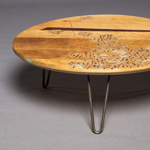 Bespoke coffee table made with recycled materials made by Stratum Marquetry