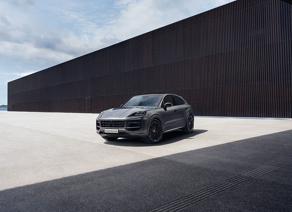 Porsche Cayenne S E-Hybrid Black Edition, Porsche Cayenne hybrid SUV review, luxury performance SUV Porsche, plug-in hybrid Porsche Cayenne, Vanadium Grey Metallic Cayenne, Porsche Centre Exeter showroom, test drive Porsche Exeter, high-performance family SUV, elegant and powerful SUV, luxury SUV with sports car performance, Porsche Cayenne 3.0-litre V6 engine, 519hp hybrid powertrain, 750Nm torque plug-in hybrid, 0–62mph in 4.7 seconds SUV, Porsche all-wheel drive traction, Porsche active suspension and adaptive dampers, composed ride in bad weather, comfortable long-distance cruiser, refined motorway driving experience, premium leather interior Porsche Cayenne, Black Edition gloss black detailing, digital curved driver display, high-tech Porsche cockpit, head-up display Porsche Cayenne, driver assistance and safety tech, Porsche Traction Management system, confident handling in rain, stable and planted SUV, sporty handling for a large SUV, dynamic drive modes including Sport, responsive steering and chassis control, hybrid SUV with electric-only driving, silent running in electric mode, everyday usability with supercar pace, spacious luxury interior for families, heated seats and comfort features, Bose surround sound system, immersive in-car audio experience, AC/DC playlist on Bose system, refined yet thrilling driving experience, performance-focused plug-in hybrid, premium SUV for UK roads, capable on motorways and country lanes, cocooned from weather and road noise, modern Porsche design language, sleek SUV lines and curves, sophisticated and understated styling, exhilarating yet reassuring performance, hybrid SUV that’s fun to drive, family car that can embarrass sports cars, luxury SUV with genuine driver engagement, Porsche engineering excellence, Porsche Cayenne E-Hybrid ownership appeal, Porsche Exeter customer experience, five-star dealership atmosphere, barista coffee Porsche showroom, porscheexeter.co.uk