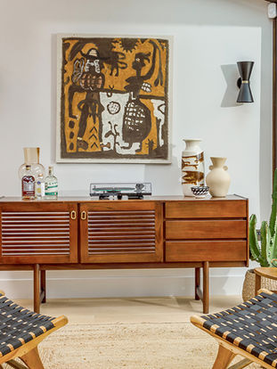 A Mid-century modern sitting area designed by Studio Far West in St Agnes, Cornwall