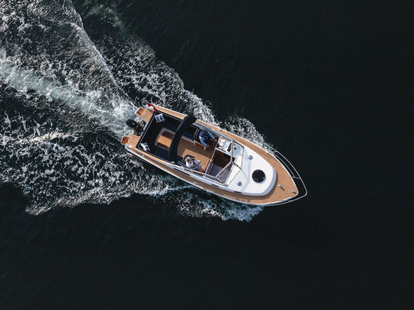 Cockwells, Cockwells Modern and Classic Boatbuilding, Cockwells boatbuilding Cornwall, Mylor Creek Boatyard, Falmouth Cornwall, Duchy Motor Launches, Duchy 25, Duchy 25 motor launch, luxury motor launch, modern cruiser, classic boat design, bespoke boatbuilder, British boatbuilder, Cornwall boatbuilder, semi-production launch, luxury launch Cornwall, motor launch UK, heritage boat design, traditional craftsmanship, contemporary boatbuilding, coastal cruising boat, estuary cruising boat, river cruiser, open-air cockpit, custom boat interior, outboard motor launch, electric motor launch, petrol outboard boat, trailerable boat, 25ft motor launch, premium day boat, weekend cruiser, luxury boating lifestyle, Raymarine display, synthetic teak decks, bespoke marine design, handcrafted boat, Southampton International Boat Show, Pendennis Group, Hardy Marine, Cornish marine industry, British marine engineering