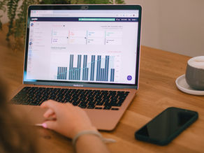 Laptop displaying a website analytics dashboard, illustrating the SEO performance data businesses can use to assess how their site is performing  Website analytics shown on a laptop screen, supporting an article about checking and improving SEO for small business websites  Person reviewing website performance metrics on a laptop, representing the kind of SEO audit and analysis needed to improve search visibility