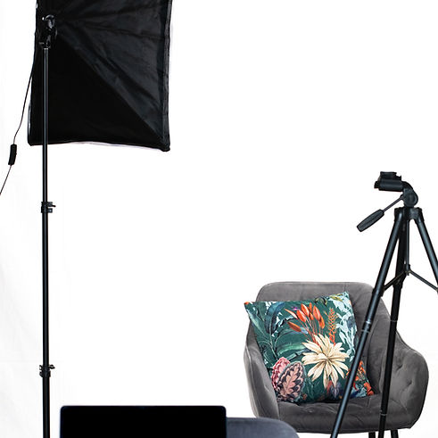 Studio de photographe à Bulle avec un spot et une chaise