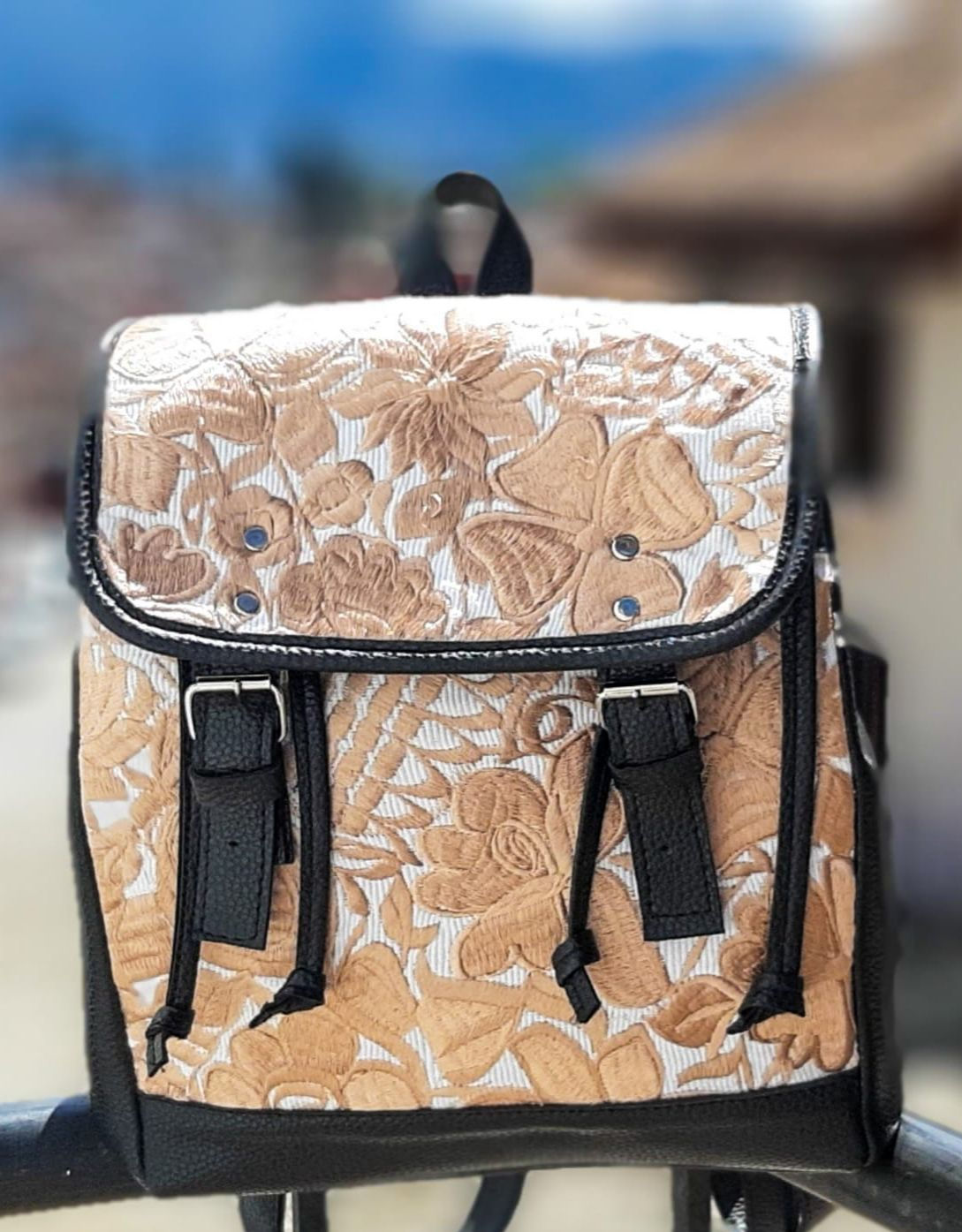 Leather embroidered floral backpack