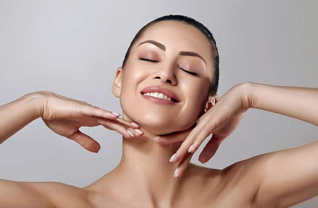 Woman with radiant skin smiles