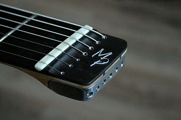 guitar suijin artisan luthier troyes mathieu penet magasin musique nogent provins sezanne bare knuckles pickups ABM bridge korina corina wood bois romilly sur seine violon basse alto reparation restauration