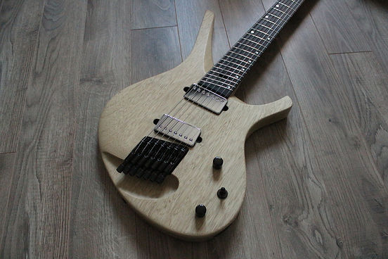 guitar suijin artisan luthier troyes mathieu penet magasin musique nogent provins sezanne bare knuckles pickups ABM bridge korina corina wood bois romilly sur seine violon basse alto reparation restauration