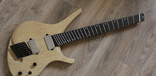 guitar suijin artisan luthier troyes mathieu penet magasin musique nogent provins sezanne bare knuckles pickups ABM bridge korina corina wood bois romilly sur seine violon basse alto reparation restauration