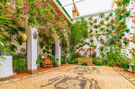 "Córdoba patios: floral gems of Andalusí heritage, famed May festival."