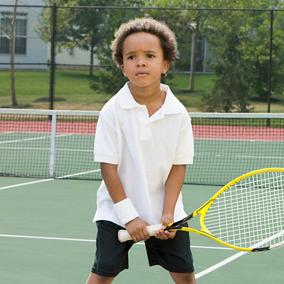 Boy Holding Racket