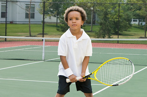 Boy Holding Racket