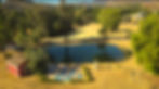 Pond and field drone shot