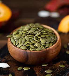 peeled-dried-pumpkin-seeds-wooden-bowl-table_64510526d824f.jpg