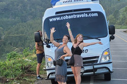 Travelers in front of shuttle traveling from Lanquin to Antigua Guatemala