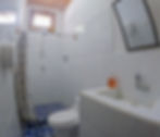 Private bathroom inside deluxe cabin at El Retiro Lodge LanquÃn Guatemala