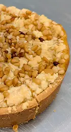 Artisan pine nut cake (torta della nonna) made at Fermento Bakery