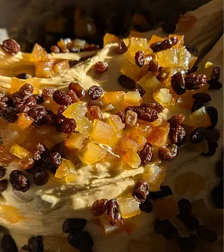 Panettone dough with candied citrus peel and raisins during production at Fermento Bakery