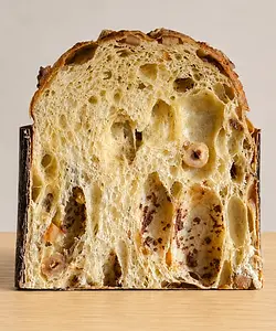 Hazelnut panettone by Fermento Bakery with roasted hazelnuts and an airy naturally leavened crumb