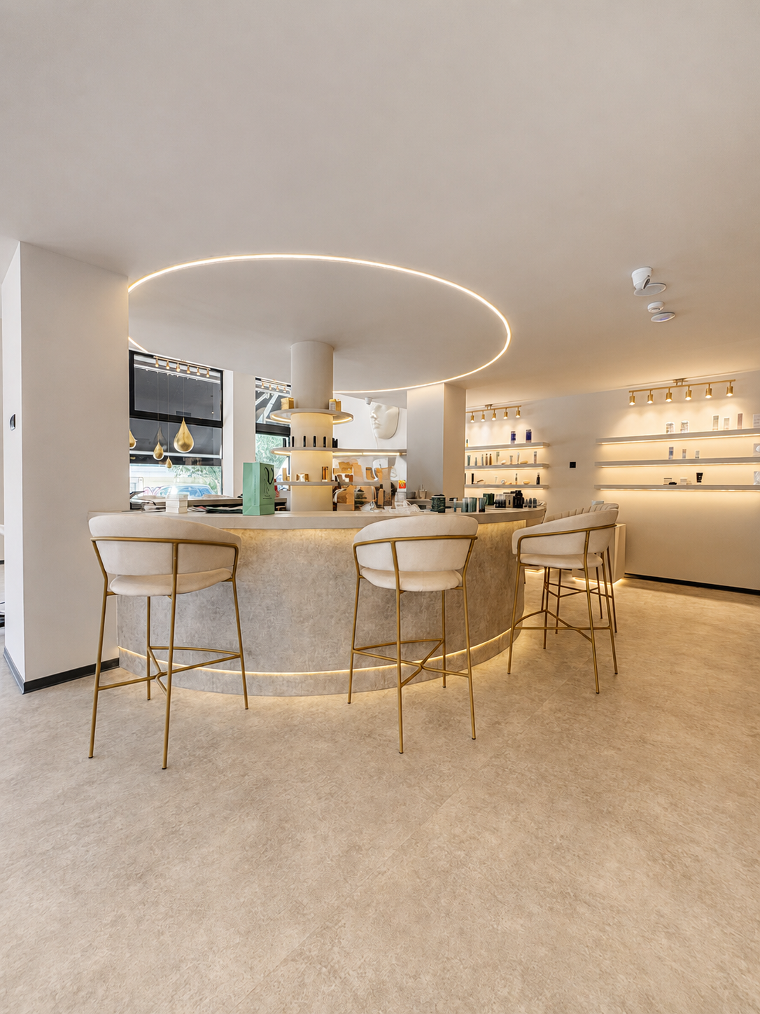 Circular central bar and illuminated ceiling detail at Vast Luxury in Elliniko, Athens — V-Architects.