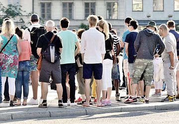 Visitors exploring the historic district of Cannes, home to elegant architecture and film festival landmarks.