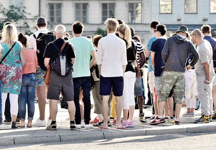 Visitors exploring the historic district of Cannes, home to elegant architecture and film festival landmarks.