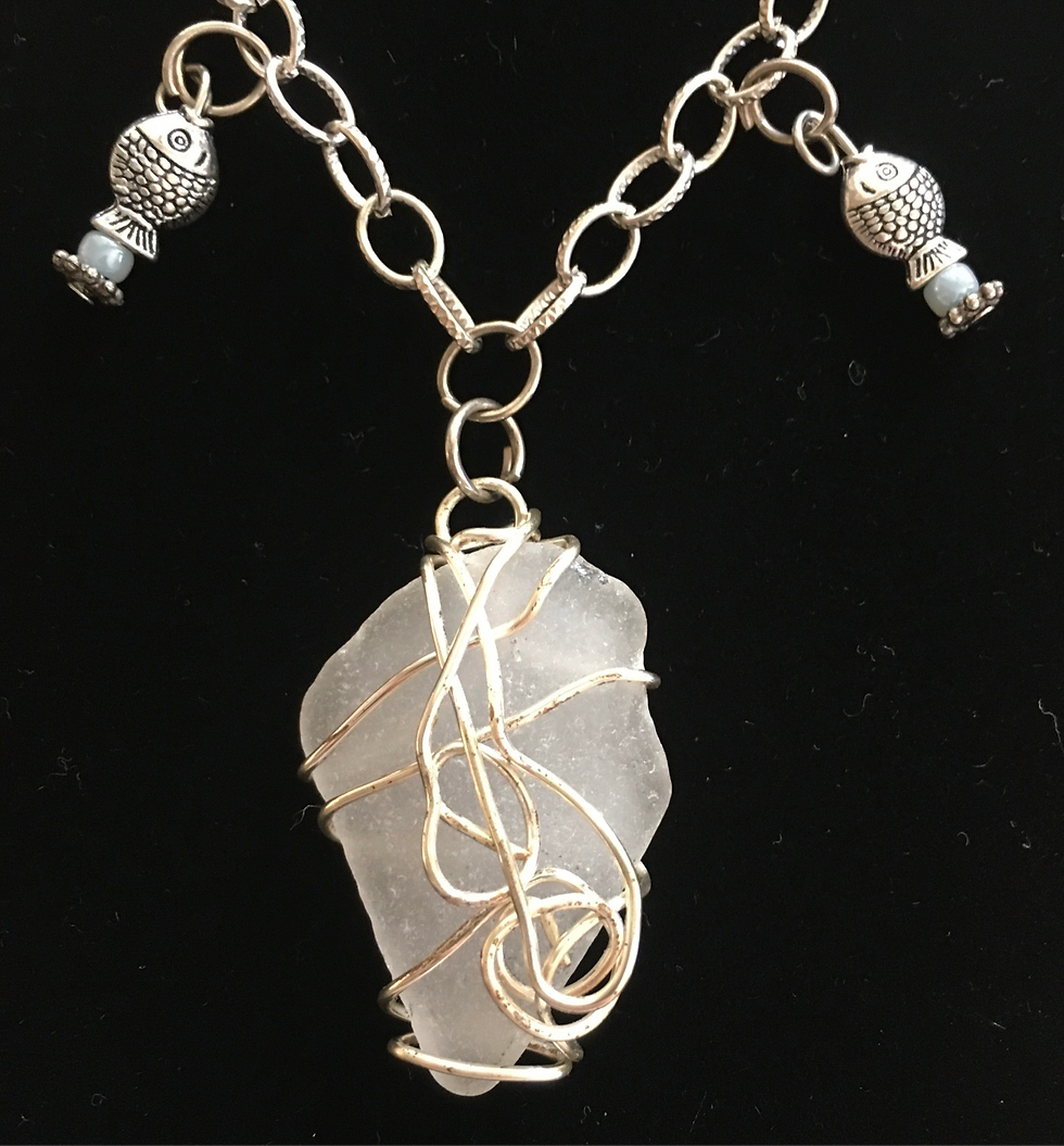 Thumbnail: Wire Wrapped Sea Glass and Fish Charms Necklace