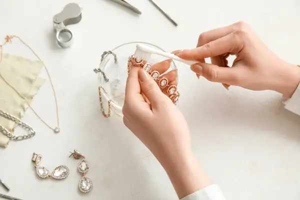 When cleaning your jewelry, avoid using abrasive materials.