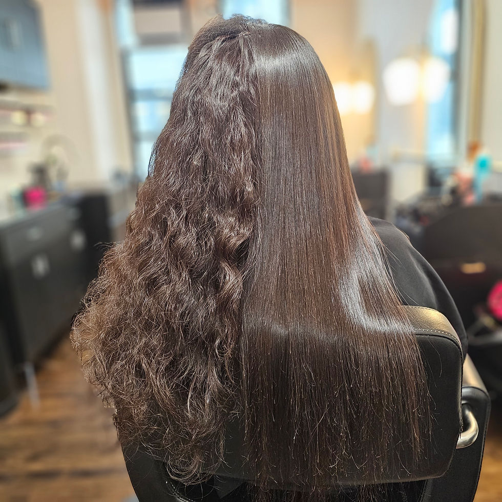 A woman with her weave installation using Nadia vassell salon premium hair extensions