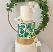 Stencil detail with gold lustre, edible printed wrap and handmade sugar flowers