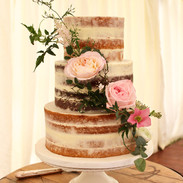 Semi naked style with cascade of fresh flowers