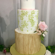 Bark effect tier with stencil detail and handmade sugar flowers
