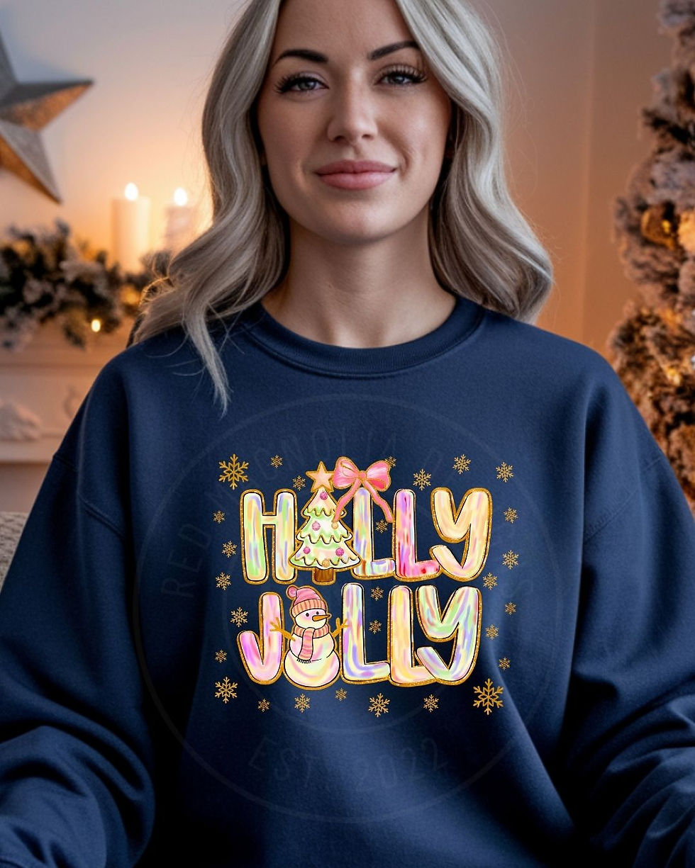 Navy sweatshirt with colorful “Holly Jolly” lettering, Christmas tree, snowman, and gold snowflakes.
