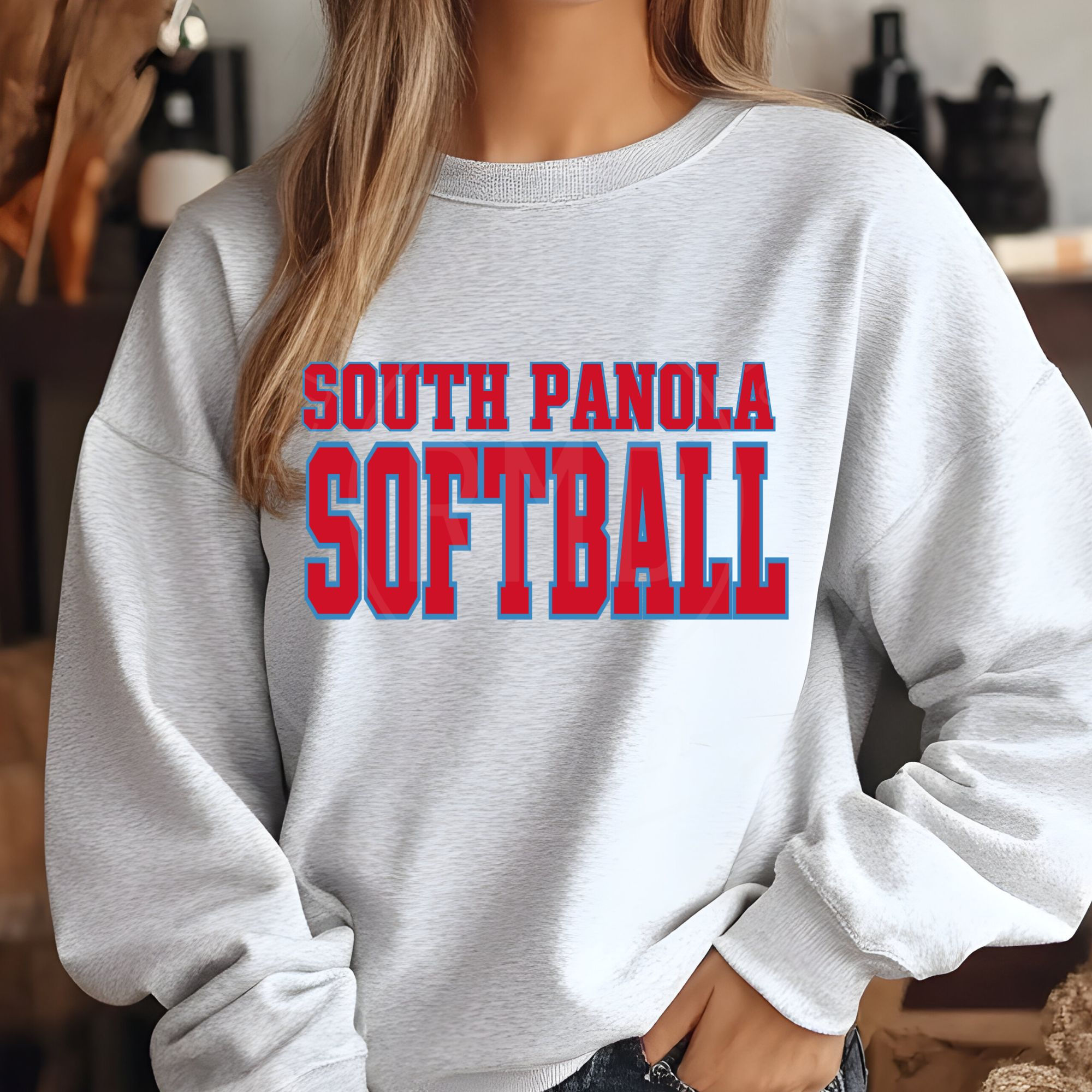 Gray sweatshirt with bold red and blue South Panola Softball varsity lettering.