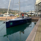 blue hull in water.jpeg