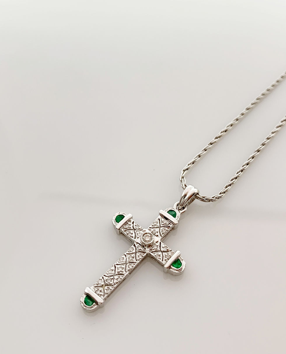 diamond and emerald cross white gold