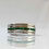 Thumbnail: emerald and diamond channel set ring
