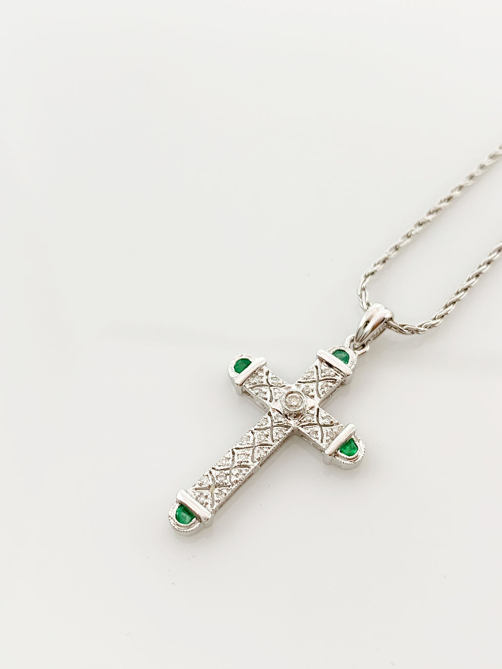 Thumbnail: diamond and emerald cross white gold