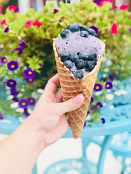 Close-up of a blueberry ice cream cone