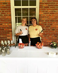 Two staff members of Kalawi Farm ready to serve
